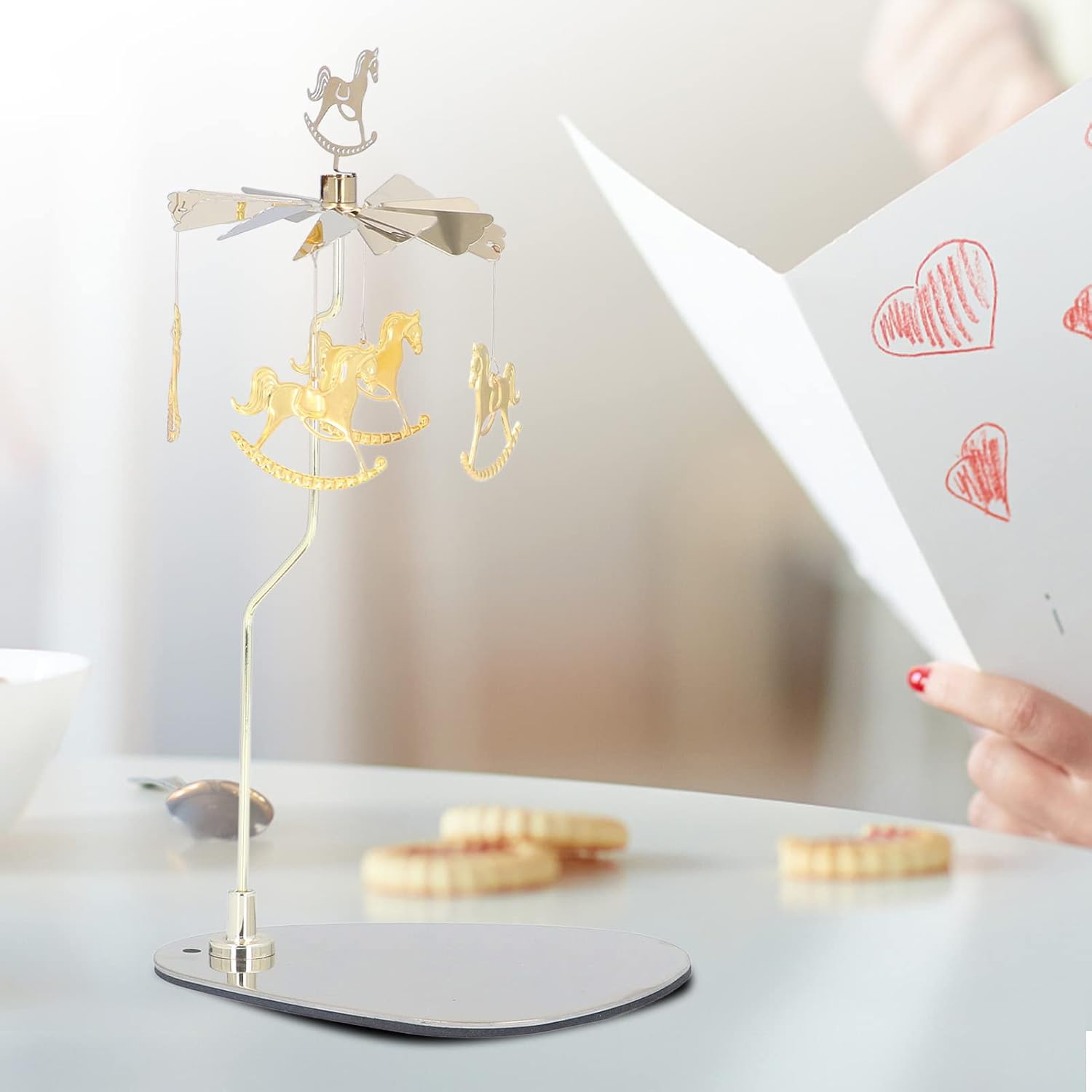 Stainless Steel Spinning Candle Holder with Wind Chime and Snowflake Design